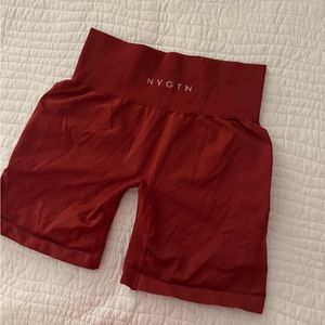 NVGTN maroon seamless gym shorts